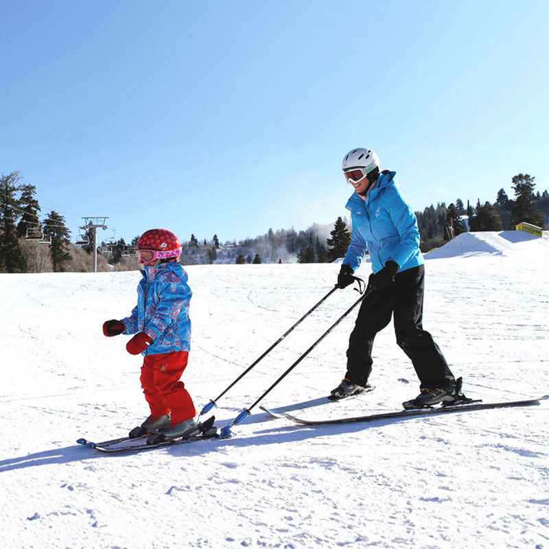 Hookease product being used by a person training her child at the ski resort
