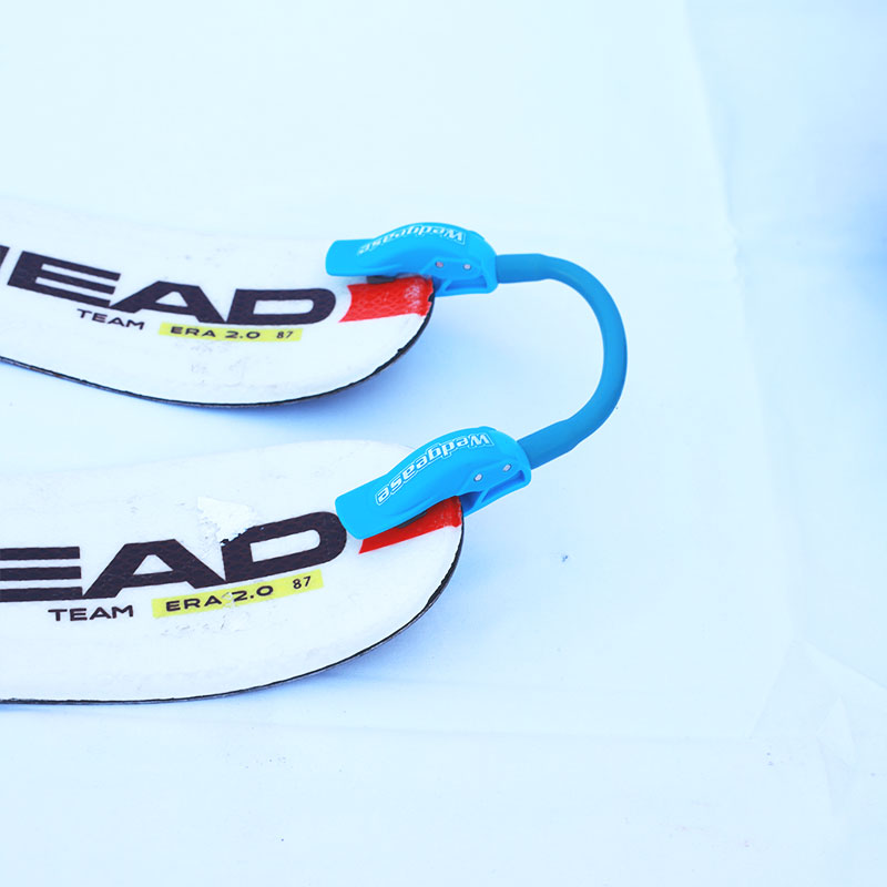close up of Wedgease being used on skis to help train kids